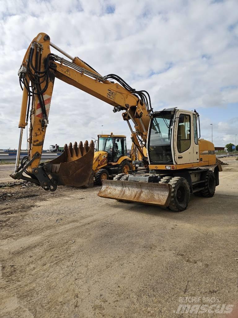 Liebherr 314 Колісні екскаватори