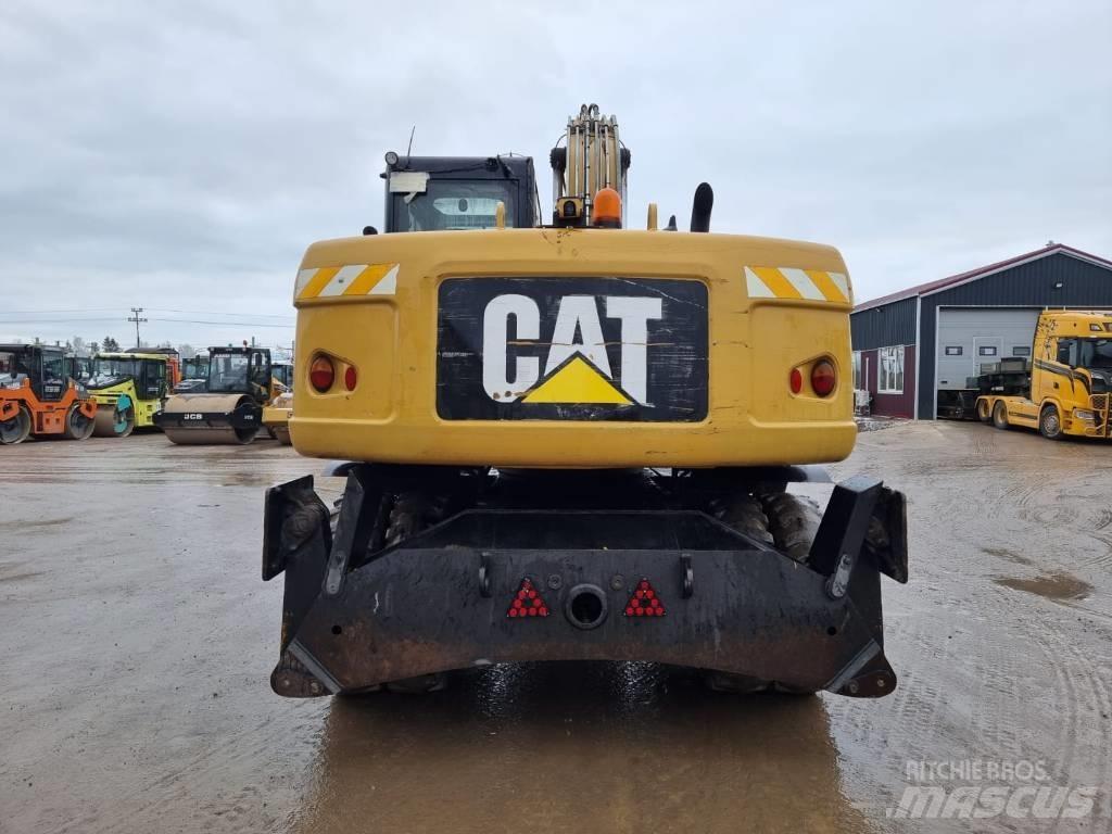 CAT M 315 D II Колісні екскаватори