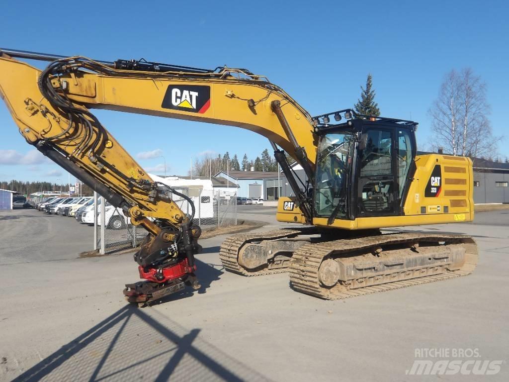 CAT 323 Гусеничні екскаватори