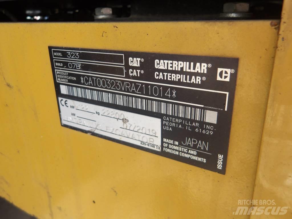 CAT 323 Гусеничні екскаватори