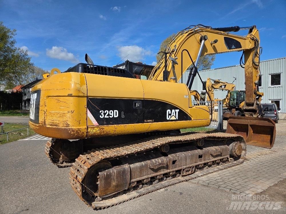 CAT 329DL Гусеничні екскаватори