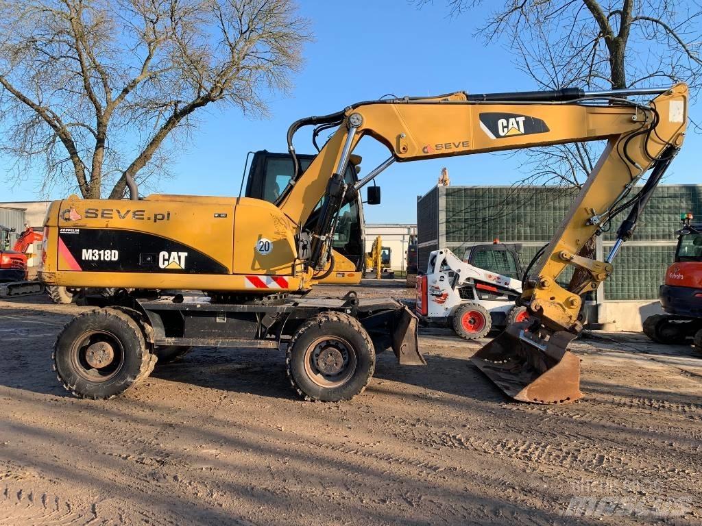 CAT M 318 D Колісні екскаватори