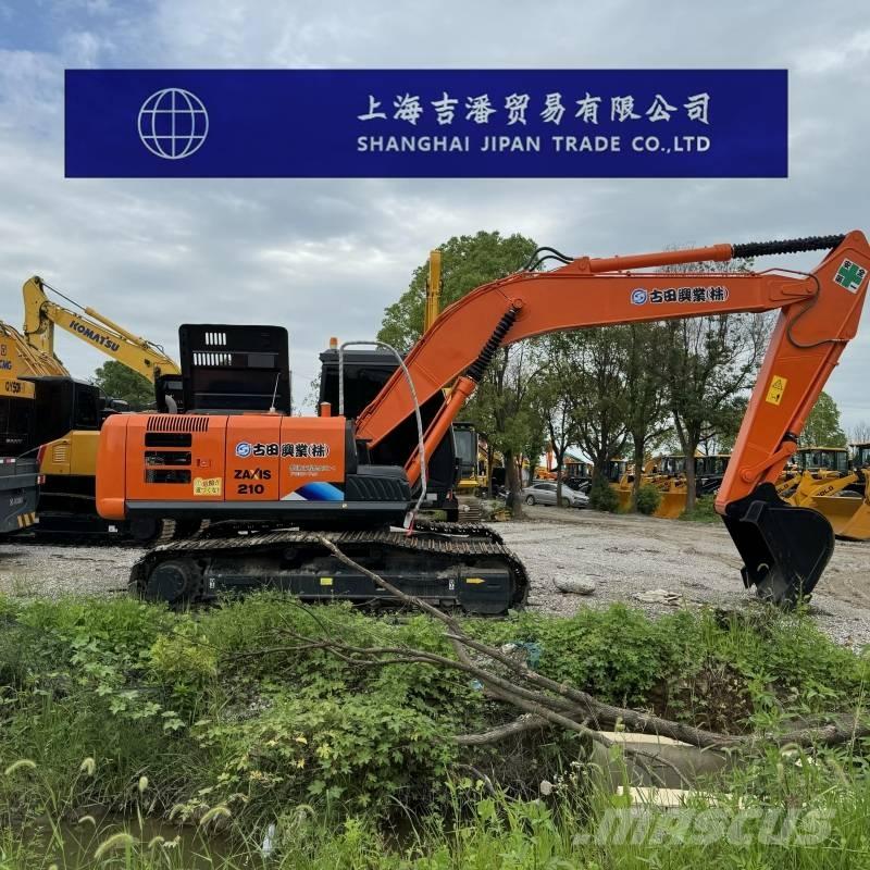 Hitachi ZX 210 Гусеничні екскаватори