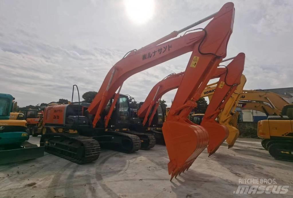Hitachi ZX 240 Гусеничні екскаватори