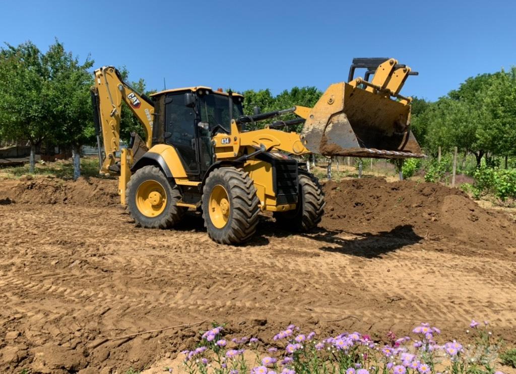 CAT 434 Екскаватори-навантажувачі