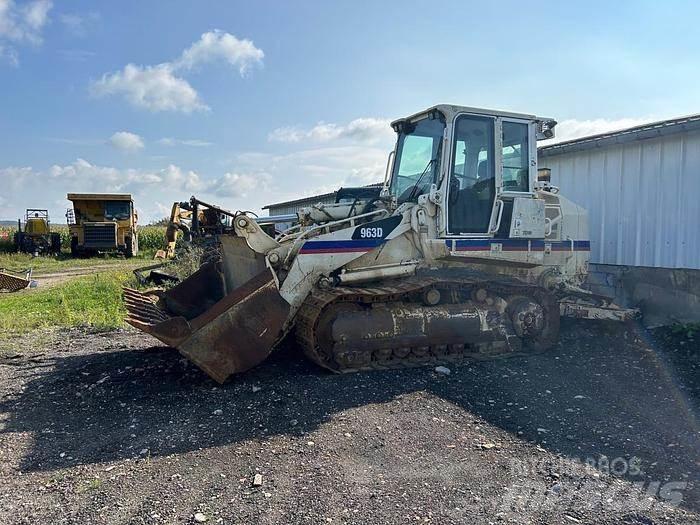 CAT 963D - Спеціальні екскаватори