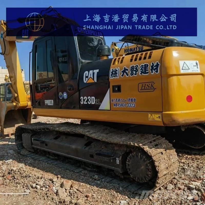 CAT 323 D Гусеничні екскаватори