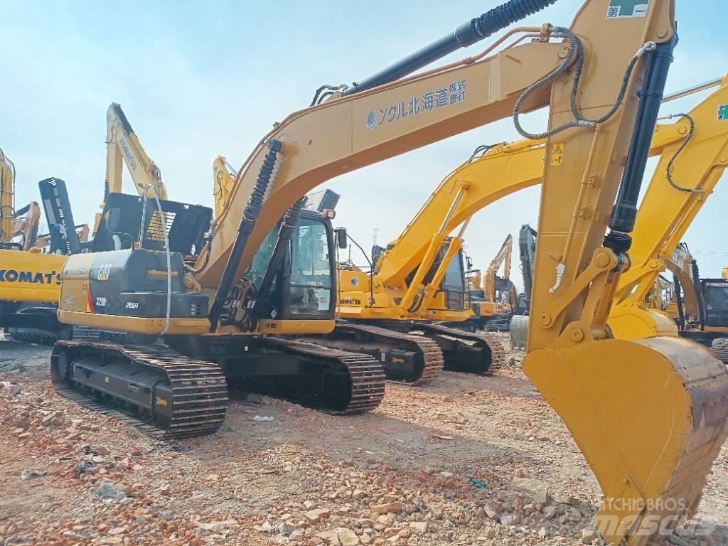 CAT 320 D2L Середні екскаватори 7т. - 12т.