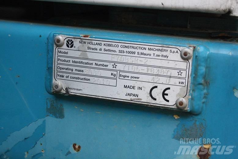  New Hollan E 70 BSR Середні екскаватори 7т. - 12т.