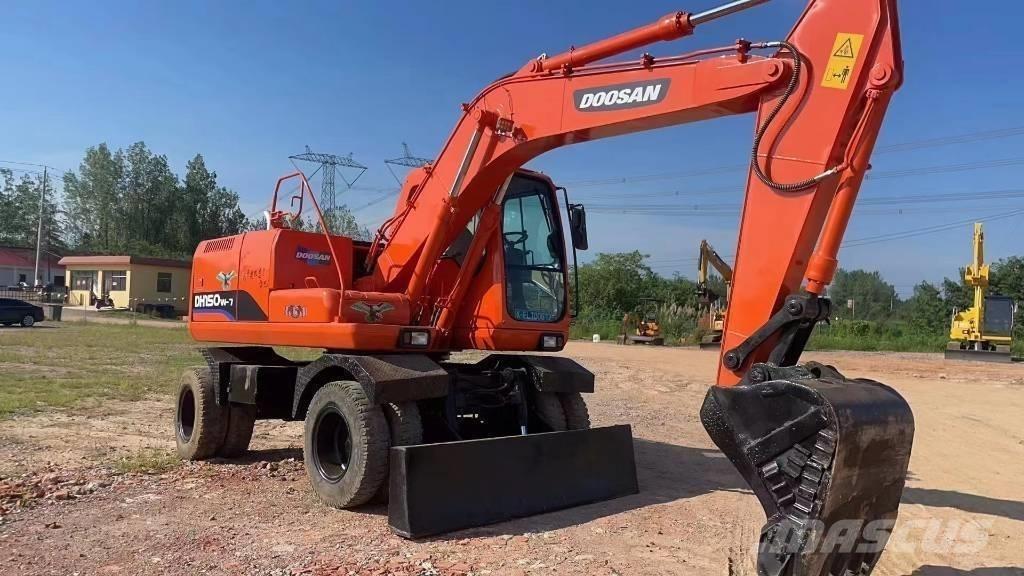 Doosan 150W-7 Колісні екскаватори