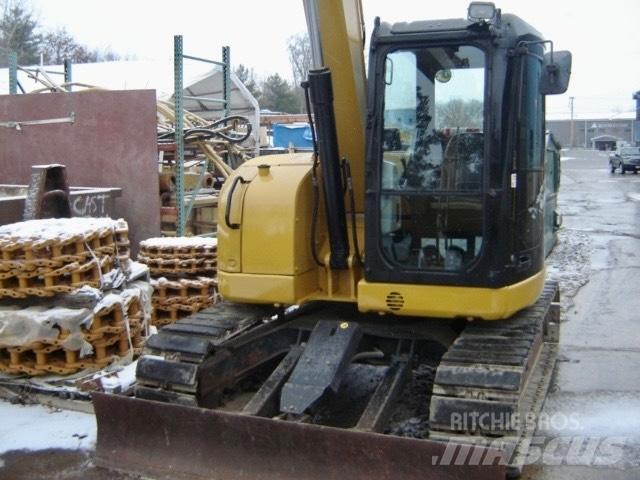 CAT 308 E Гусеничні екскаватори