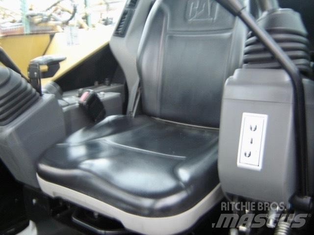 CAT 308 E Гусеничні екскаватори