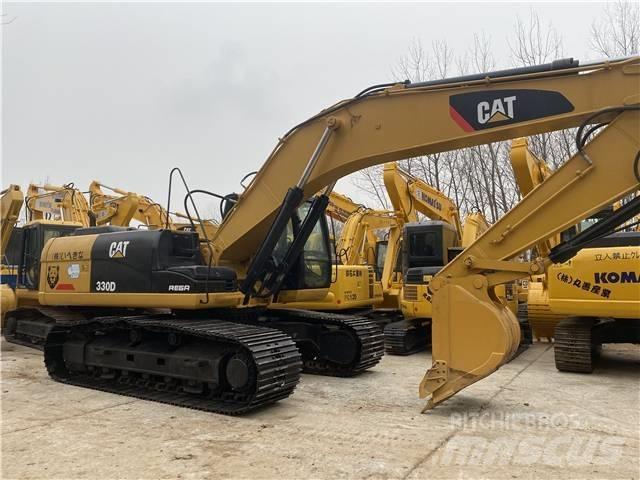 CAT 330DL Гусеничні екскаватори