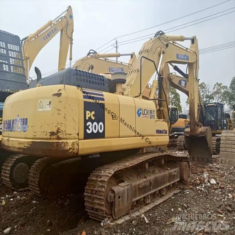 Komatsu 300 Гусеничні екскаватори