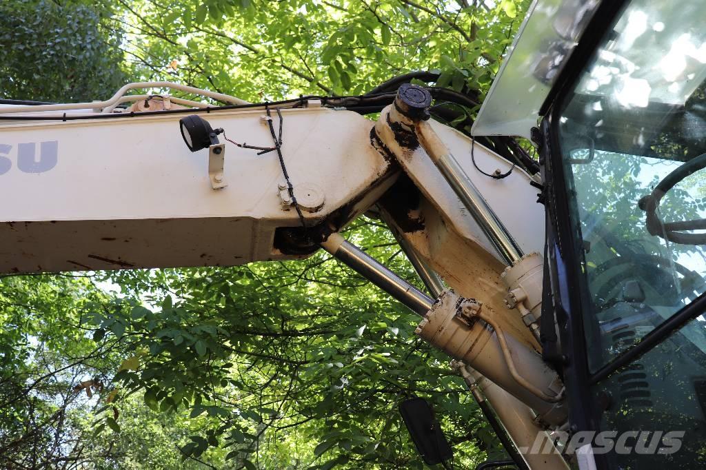 Komatsu PW 140-7 Екскаватори-навантажувачі