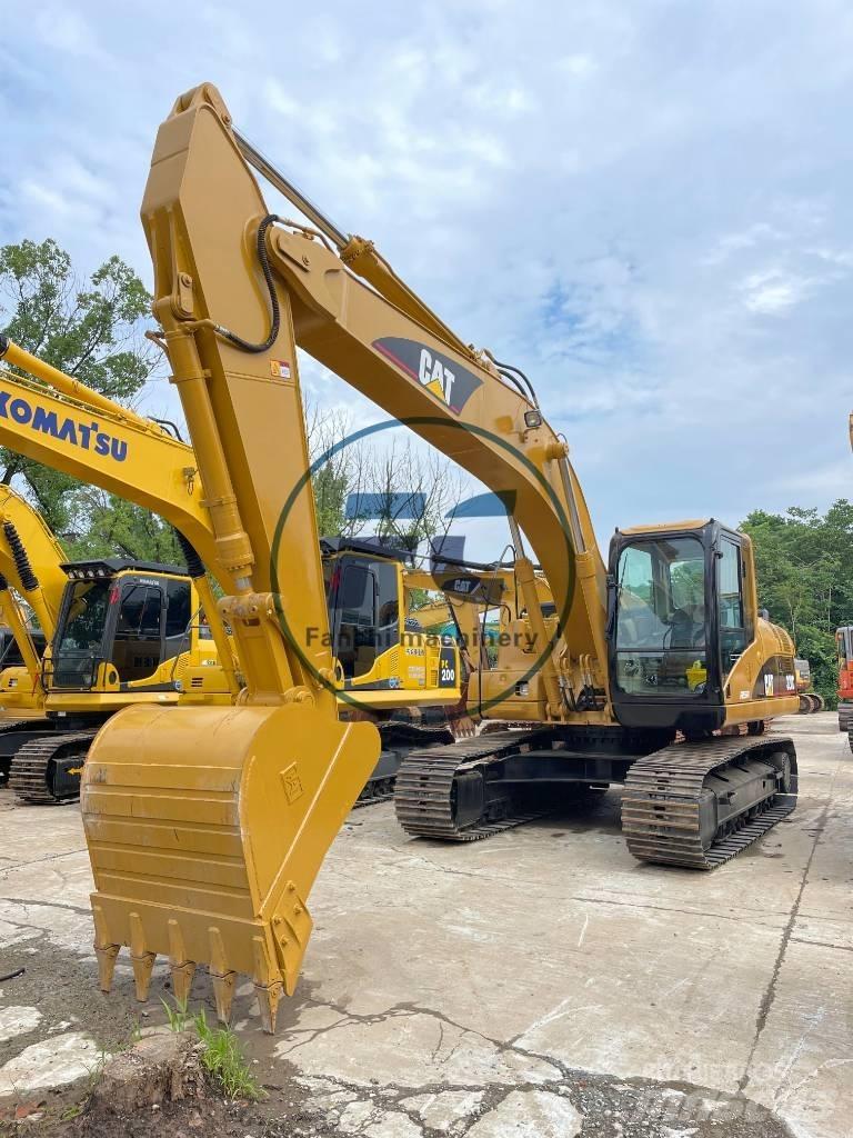 CAT 320C Середні екскаватори 7т. - 12т.