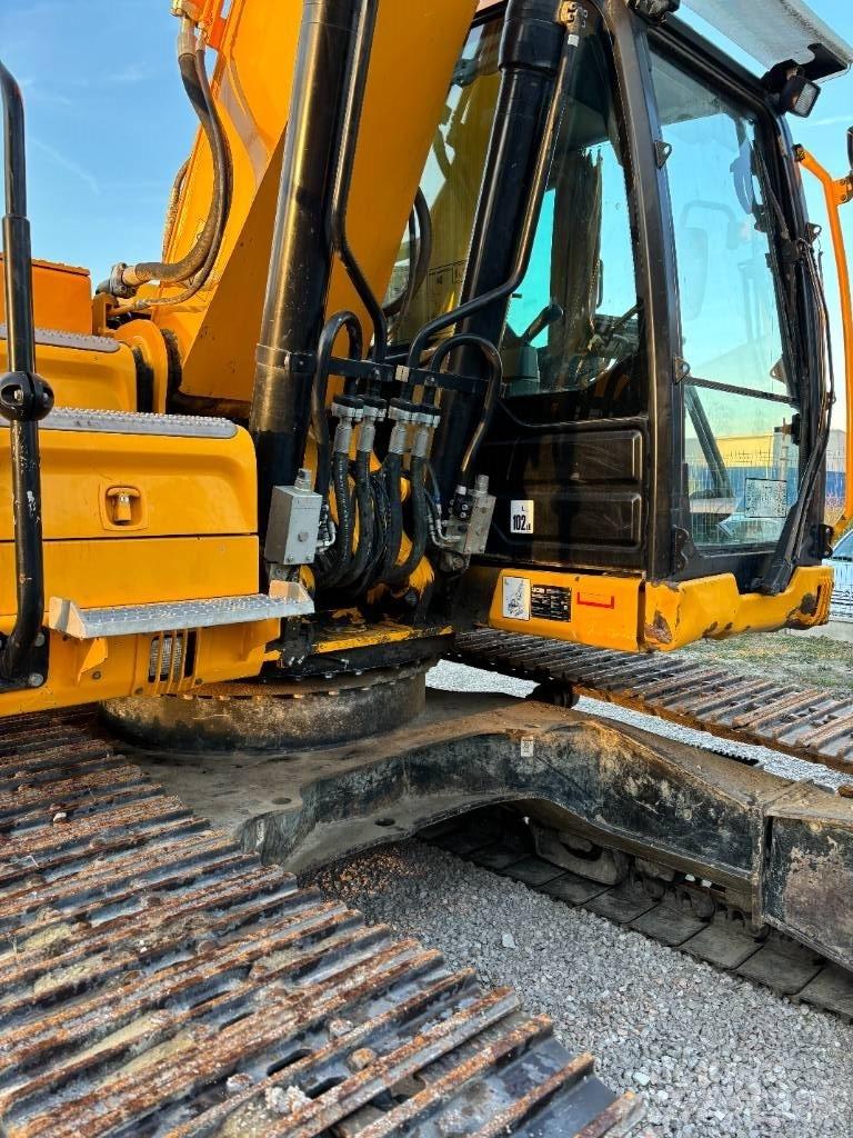 JCB 220 Гусеничні екскаватори