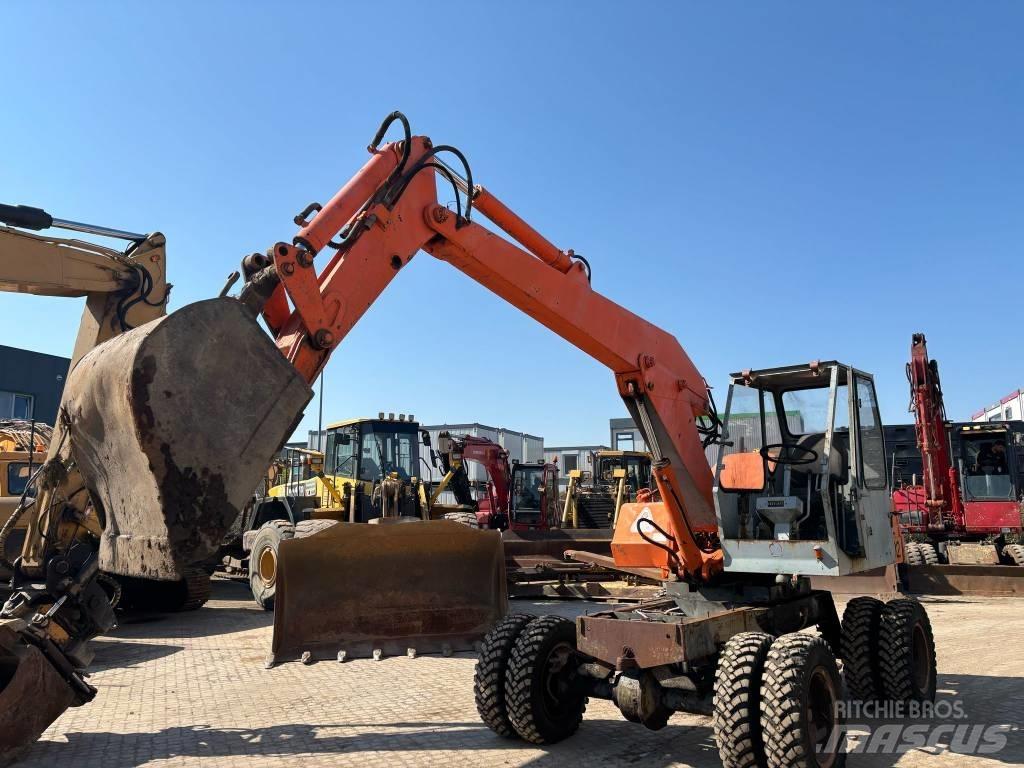 Atlas 120.2E Колісні екскаватори
