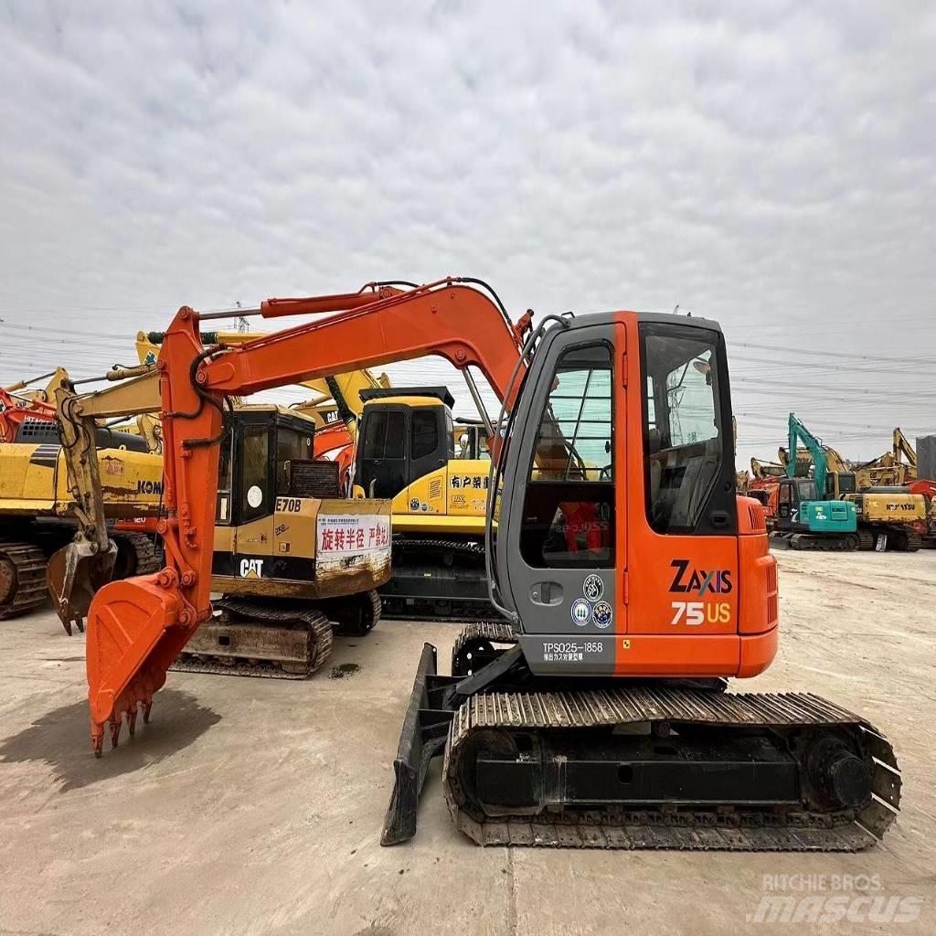 Hitachi ZX 75 US Середні екскаватори 7т. - 12т.