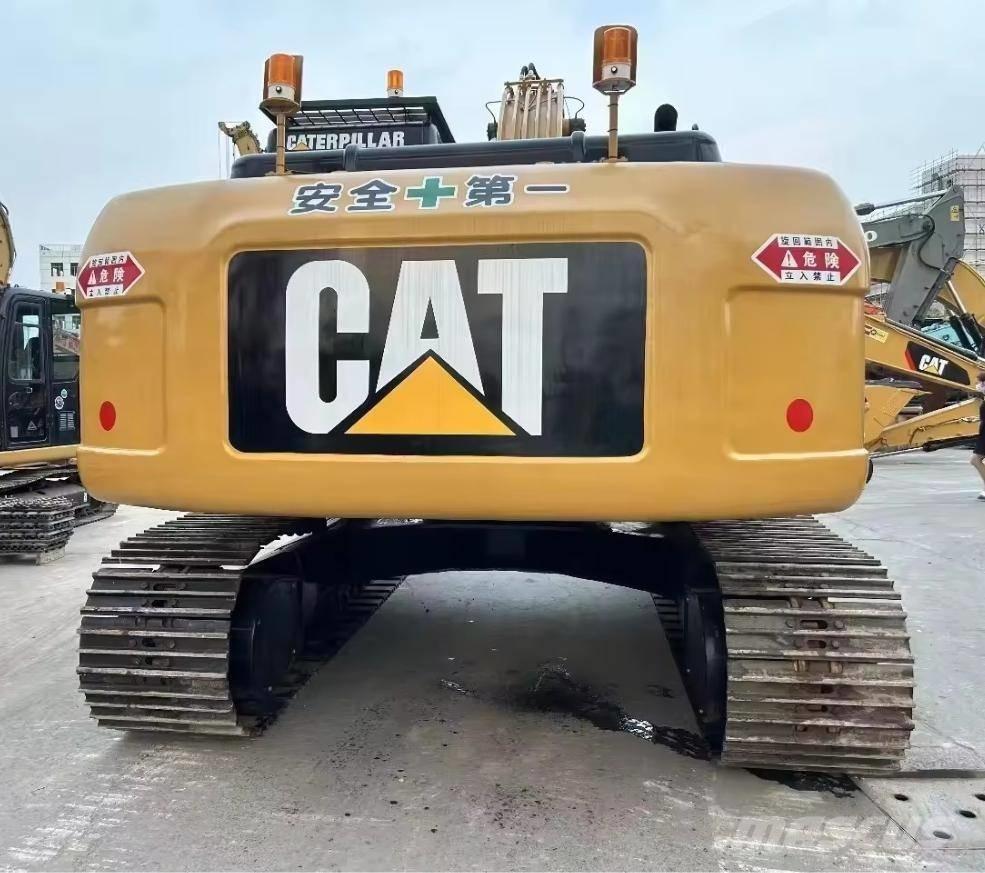 CAT 323 D Гусеничні екскаватори
