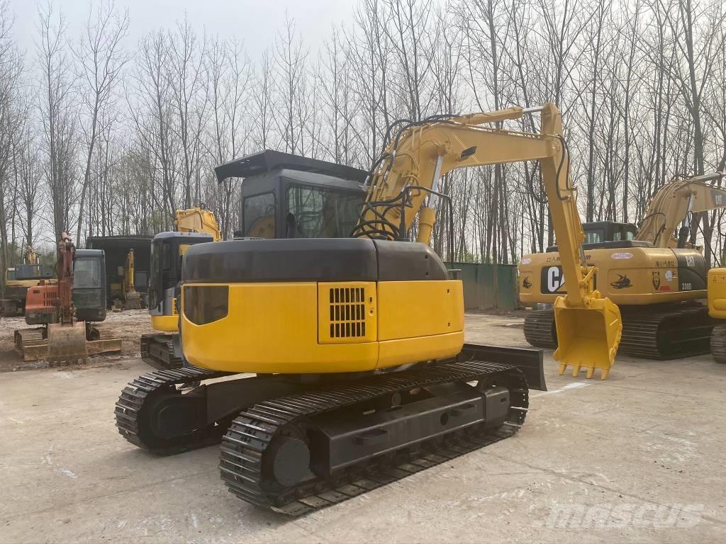 Komatsu PC128US Гусеничні екскаватори