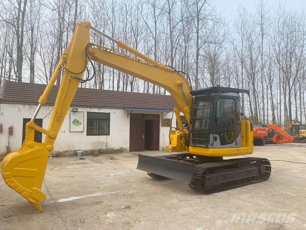 Komatsu PC128US Гусеничні екскаватори