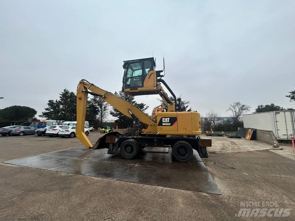 CAT MH3022 Колісні екскаватори
