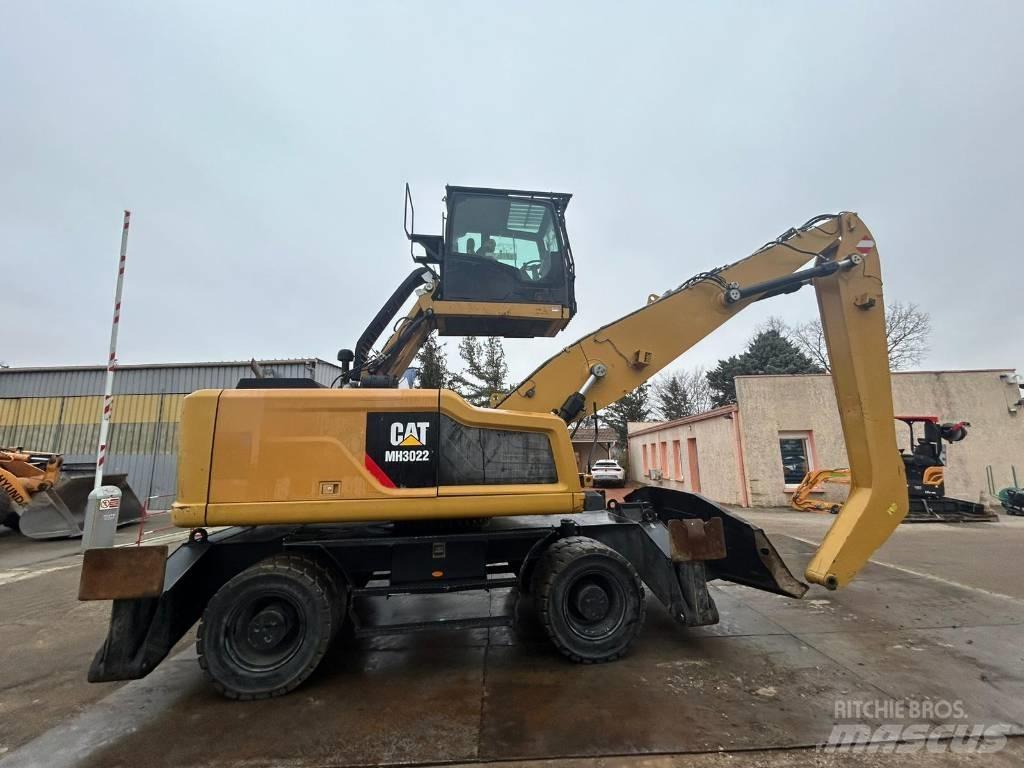 CAT MH3022 Колісні екскаватори