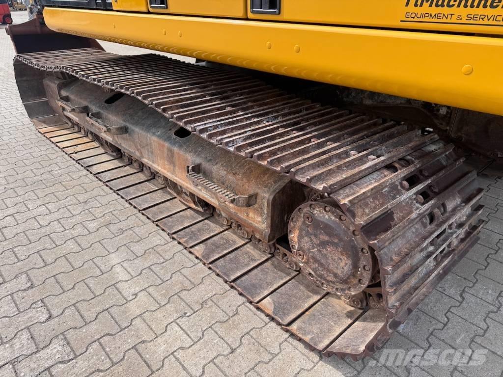 CAT 323 Гусеничні екскаватори