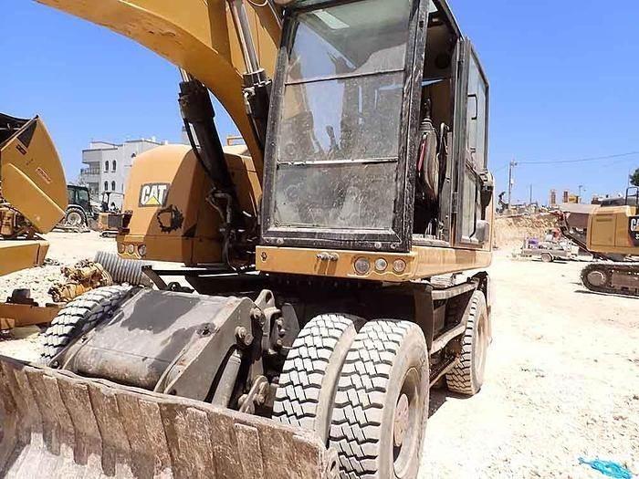 CAT M320F Спеціальні екскаватори
