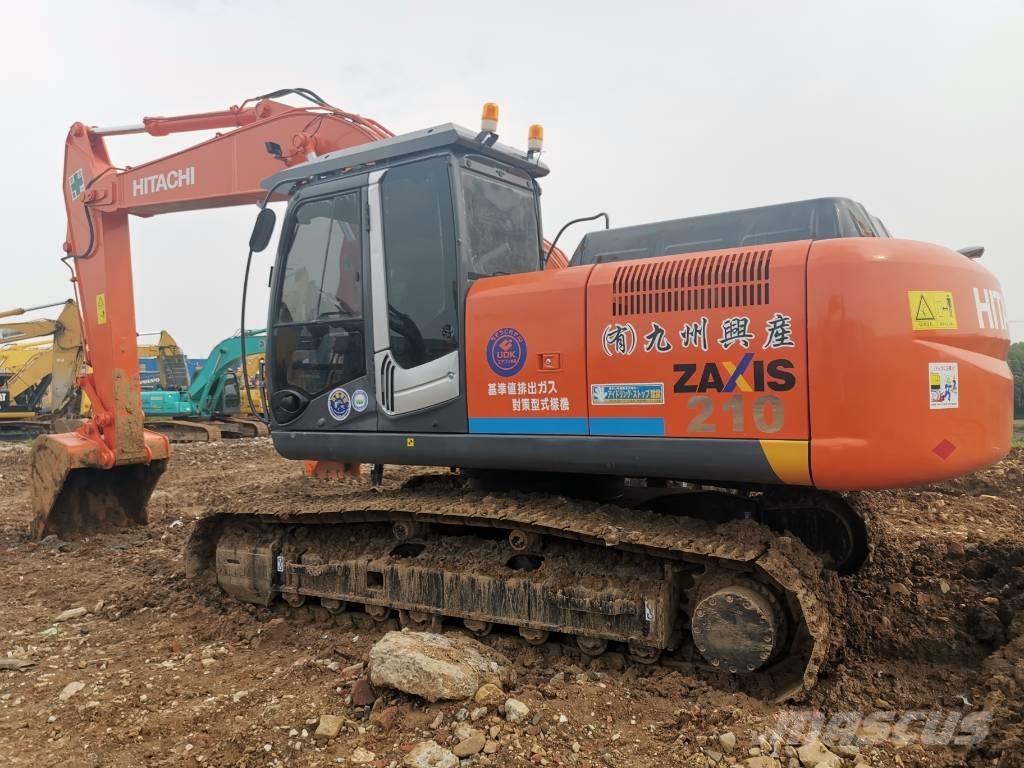Hitachi zx210 Гусеничні екскаватори
