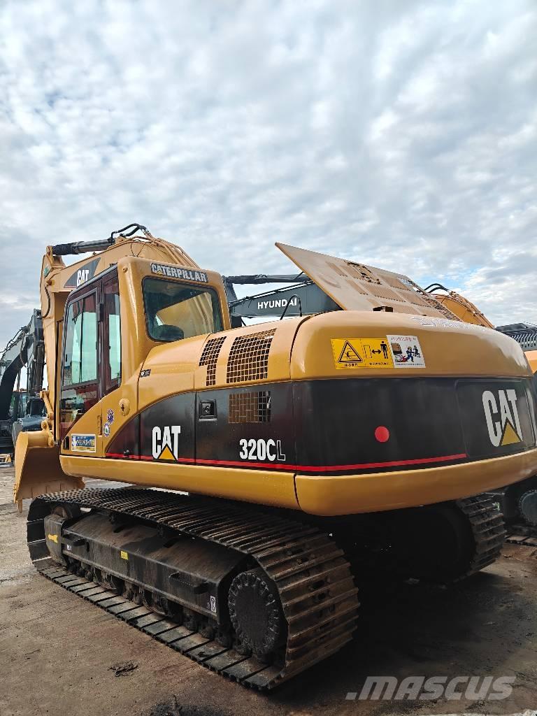 CAT 320 C Гусеничні екскаватори