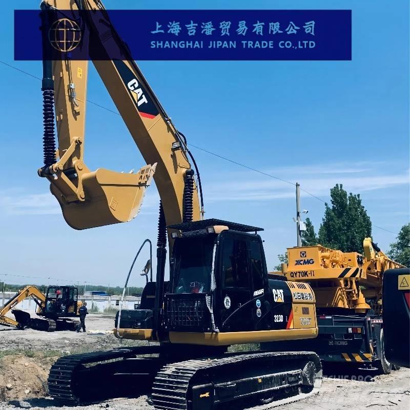CAT 323 D Гусеничні екскаватори