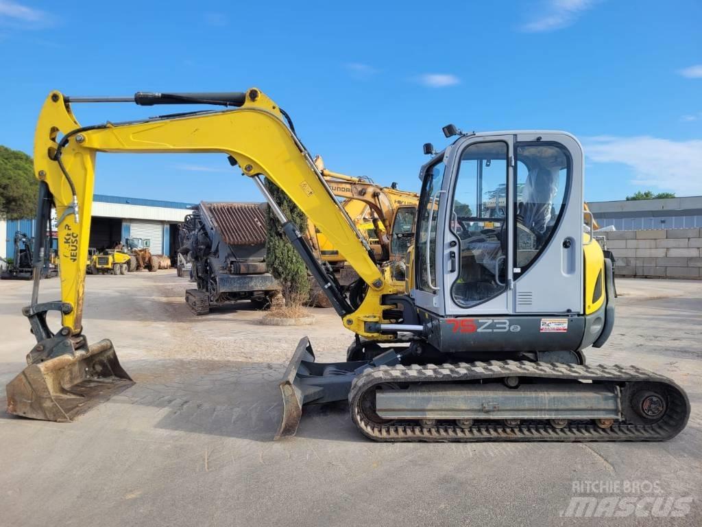 Neuson 75 Z 3 Середні екскаватори 7т. - 12т.