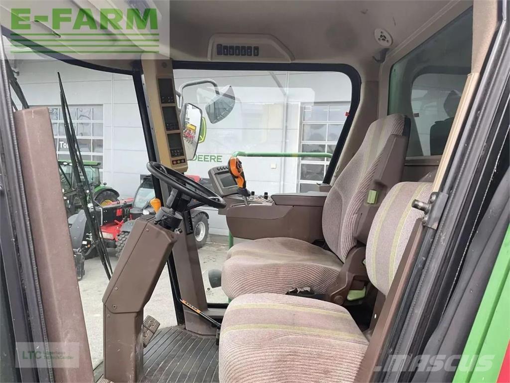 John Deere t560hm Зернозбиральні комбайни