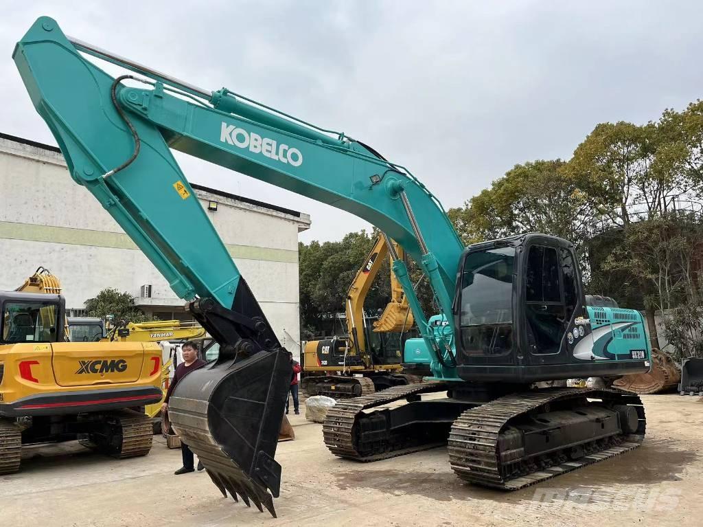 Kobelco SK 210 Гусеничні екскаватори