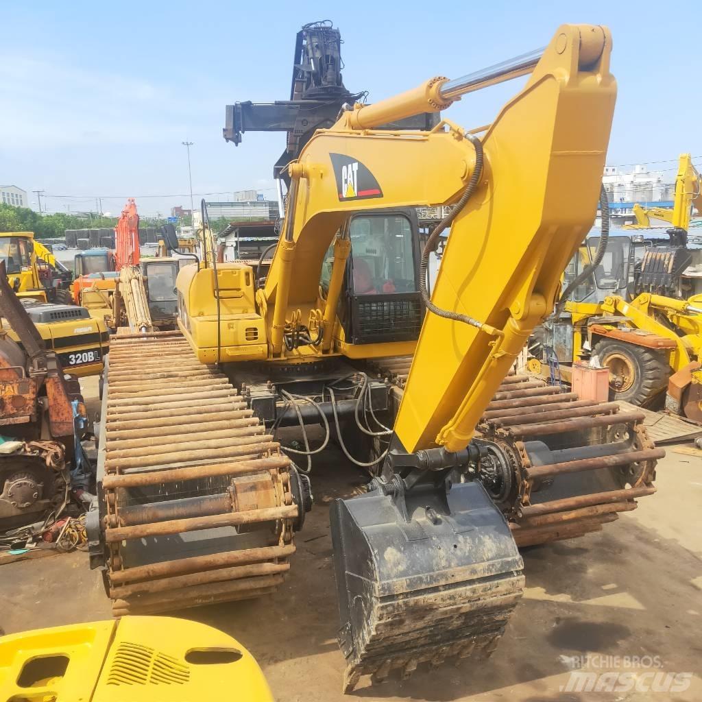 CAT 320C Екскаватори-амфібії