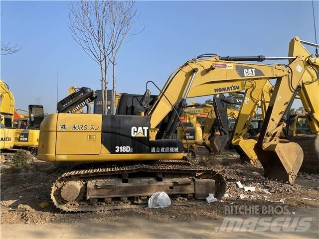 CAT 318D Гусеничні екскаватори