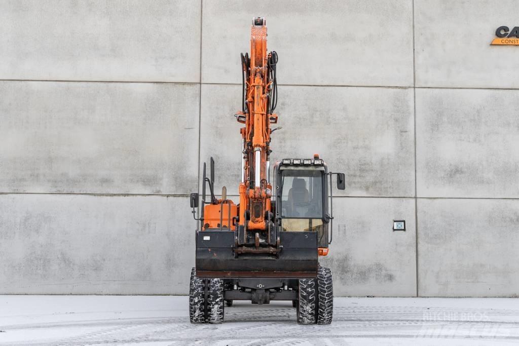 Doosan DX 140 W-3 Колісні екскаватори