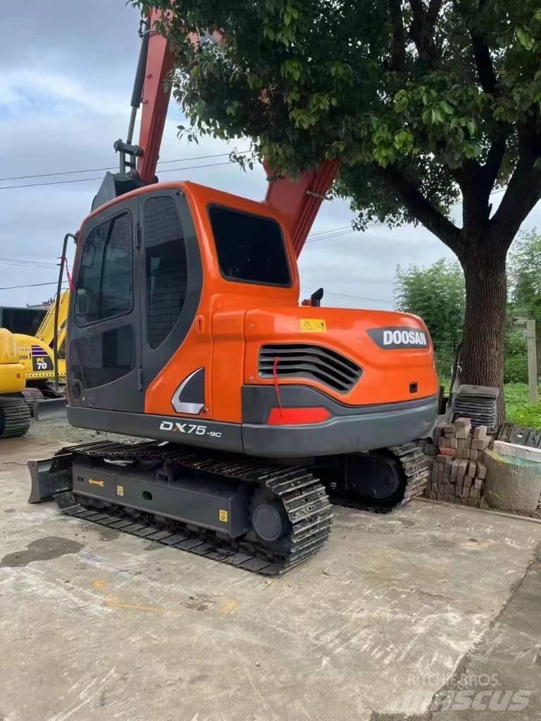 Doosan DX75 Міні-екскаватори < 7т