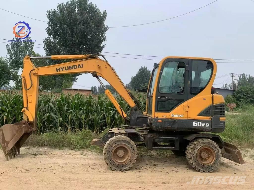 Hyundai 60 W Колісні екскаватори
