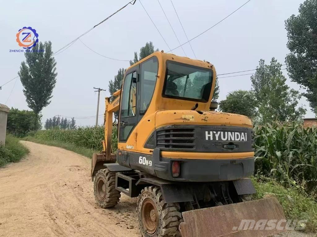 Hyundai 60 W Колісні екскаватори