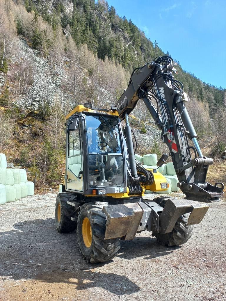 Mecalac 12 M XT Екскаватори-навантажувачі