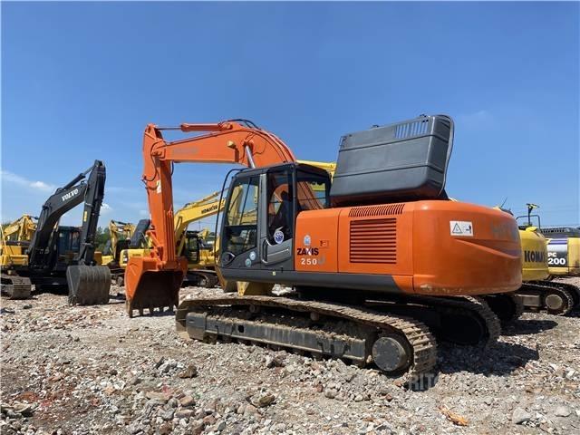 Hitachi ZX 250 Гусеничні екскаватори