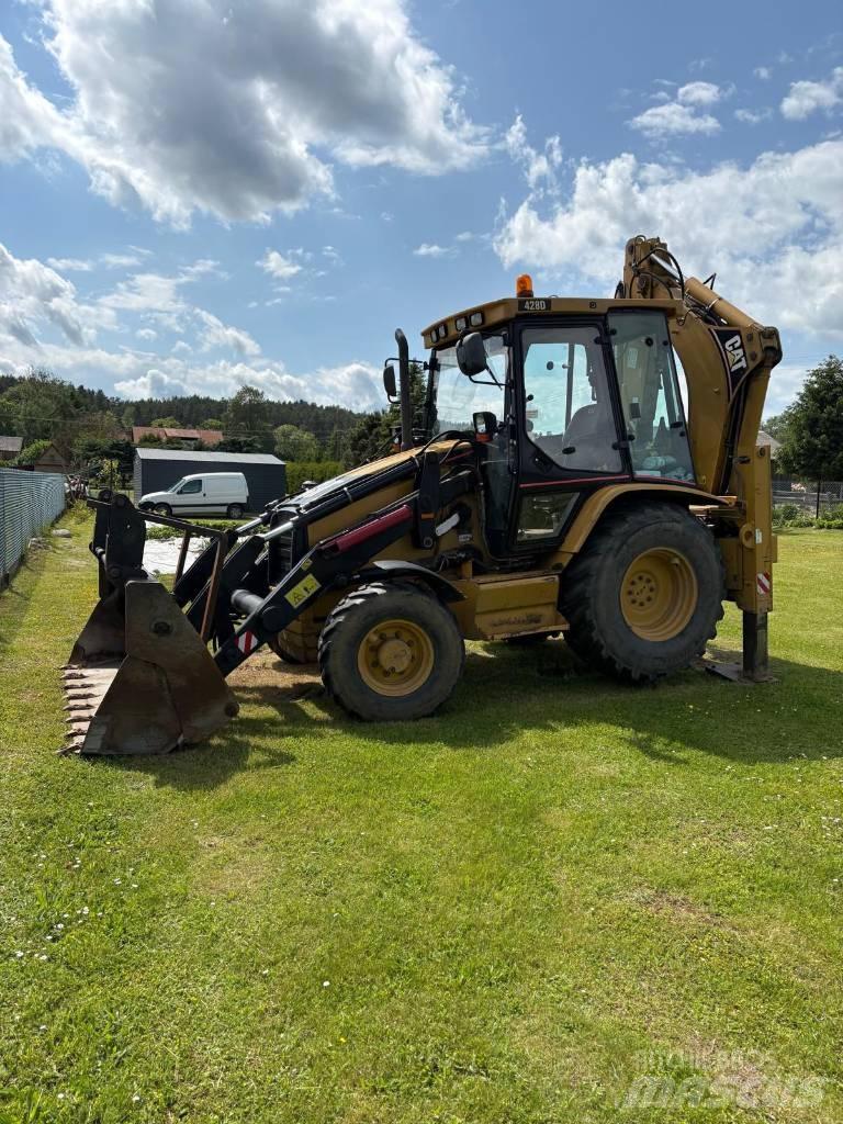 CAT 428 D 4x4 Екскаватори-навантажувачі
