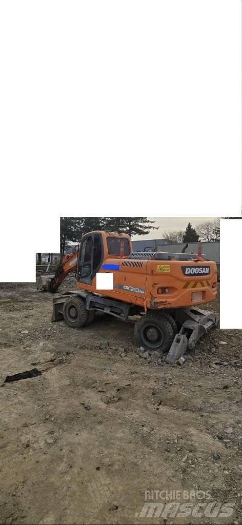 Doosan DX 210 W Колісні екскаватори