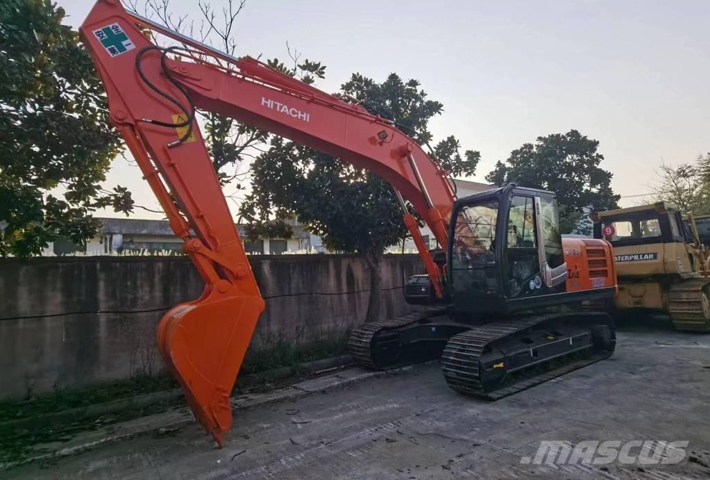 Hitachi ZX 200 Гусеничні екскаватори