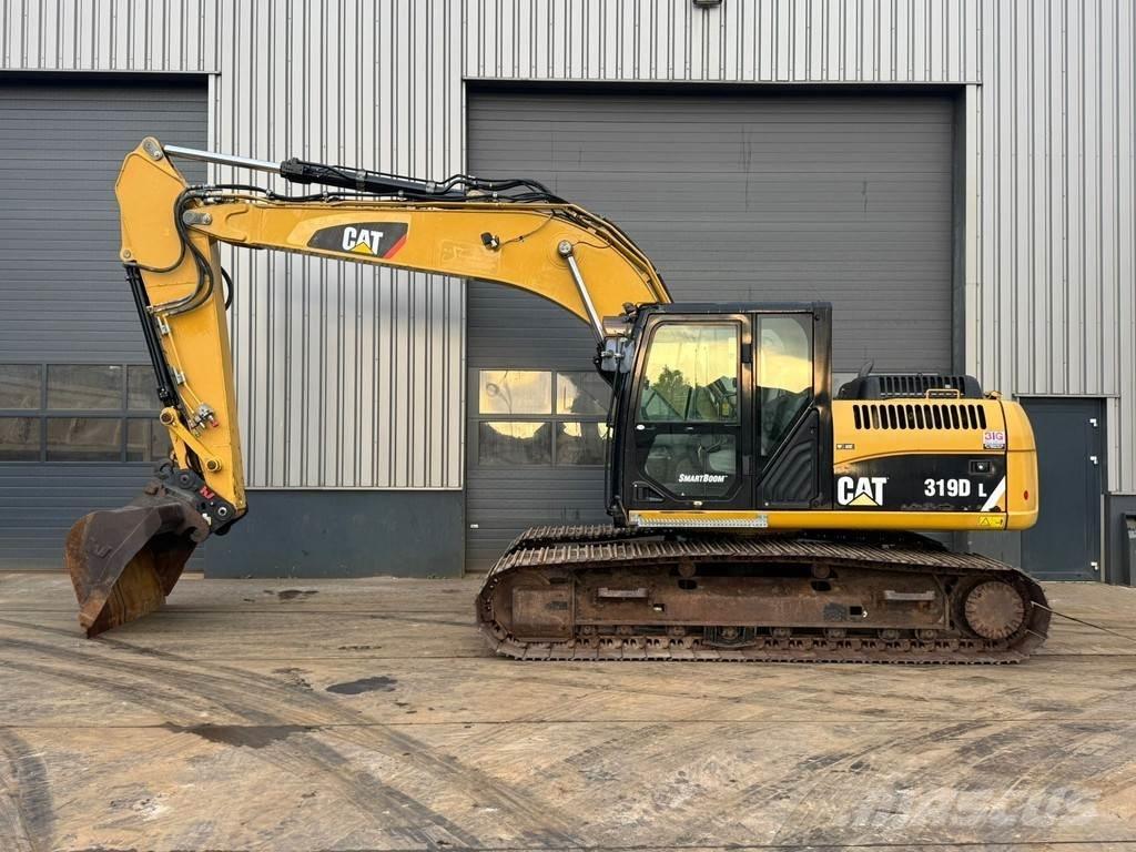 CAT 319DL Гусеничні екскаватори
