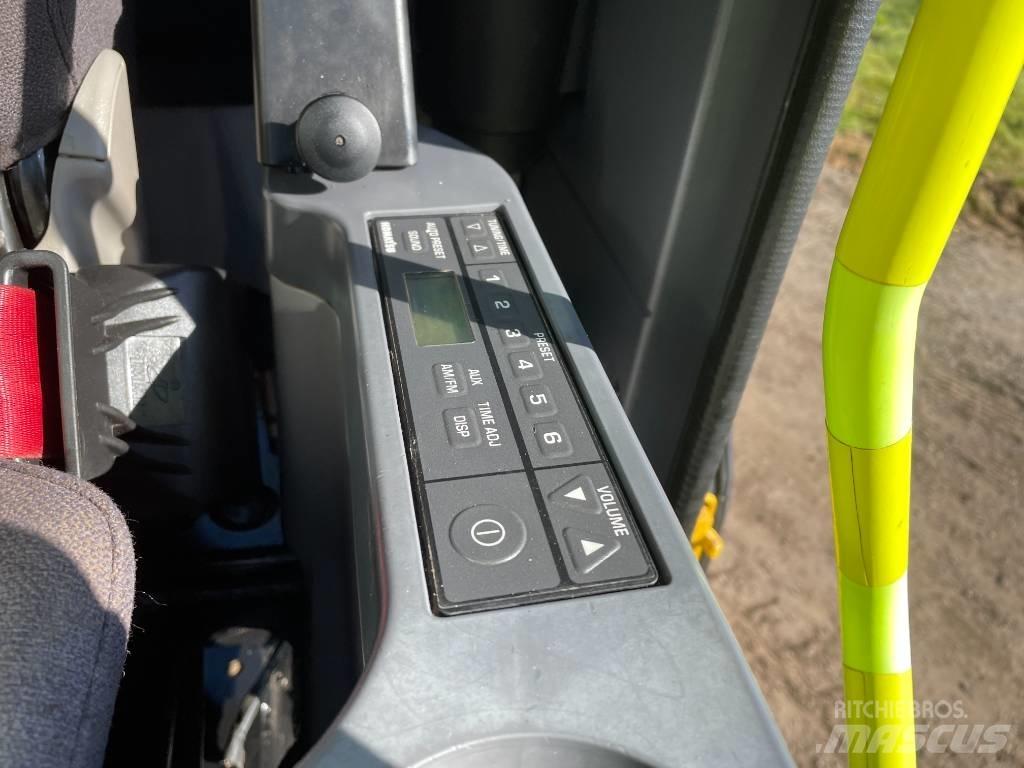 Komatsu PC 210 Екскаватори з великим вилітом