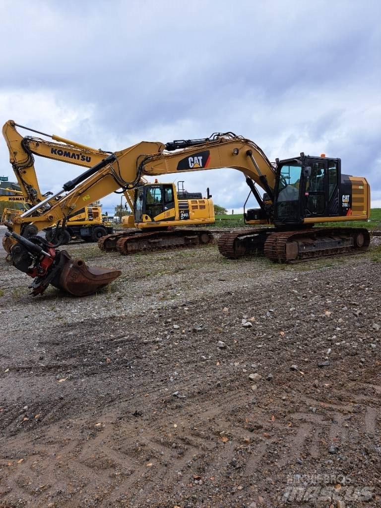 CAT 318 E L Гусеничні екскаватори
